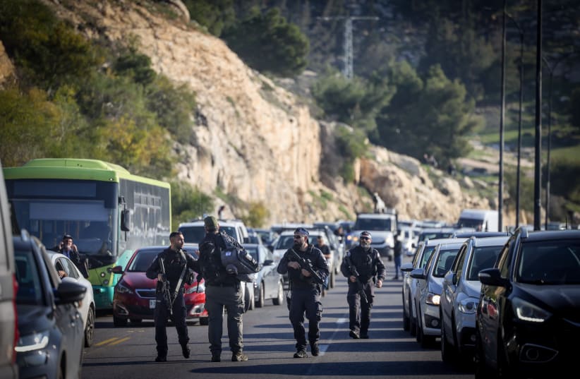  The scene of a shooting attack on Highway 1, near Ma'ale Adumin, on February 22, 2024 (photo credit: Chaim Goldberg/Flash90)