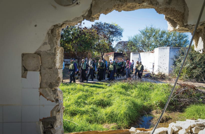 RELIGIOUS LEADERS tour the destruction in Kibbutz Kfar Aza. (photo credit: FLASH90)