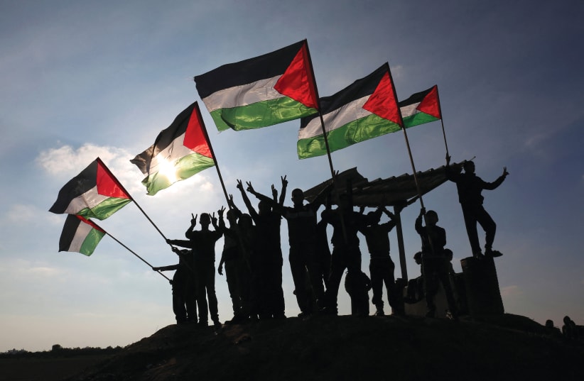 FANTASY OF Palestine: Dead and buried.  (photo credit: Said Khatib/AFP via Getty Images)
