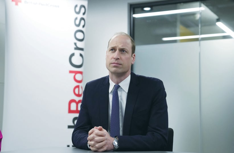  BRITAIN’S WILLIAM, Prince of Wales, visits the British Red Cross at its headquarters in London on Tuesday (photo credit: REUTERS/KIN CHEUNG)