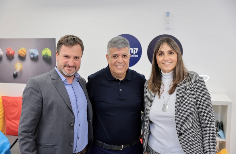  (R to L) Michal Cohen, CEO Rashi Foundation; Yitzhak Danino, Mayor of Ofakim; and Oren Sagi, CEO Cisco Israel, at the Magnet youth center in Ofakim (photo credit: Oz Schecter)