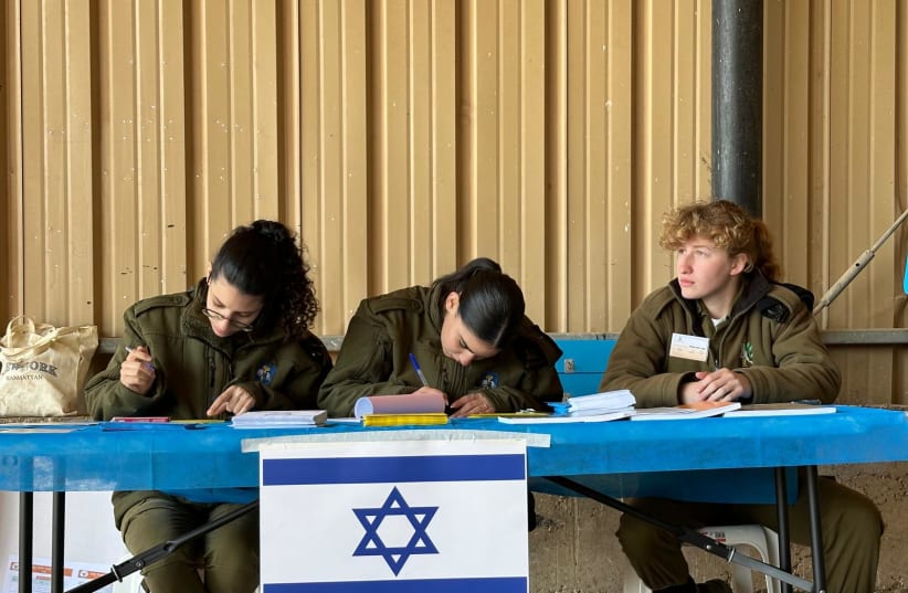  IDF soldiers at a military polling station. (photo credit: IDF)