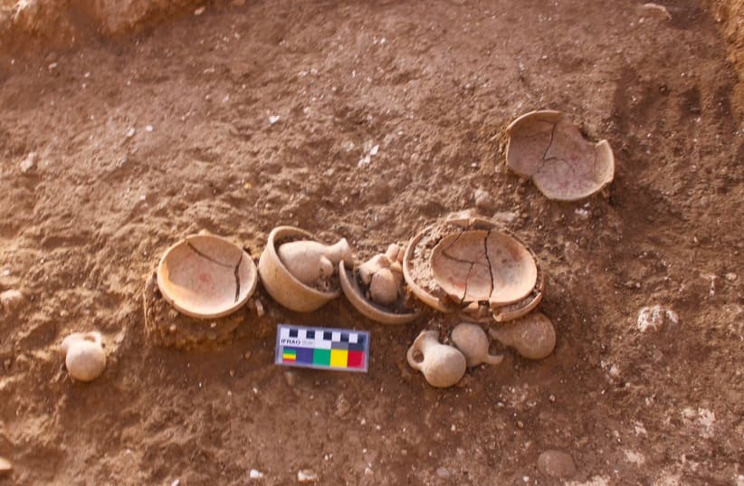  Temple offerings - miniature as well as food serving vessels, and a shell of marine mollusc, Tonna galea found in one of the temples  (photo credit: AREN MAEIR)