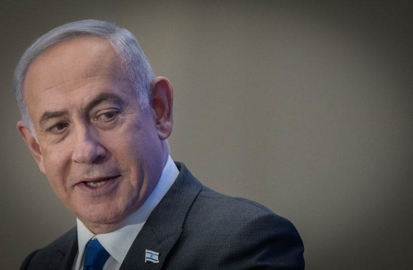  Israeli Prime Minister Benjamin Netanyahu attends a Conference of Presidents of Major American Jewish Organizations in Jerusalem, on February 18, 2024. (photo credit: Chaim Goldberg/Flash90)