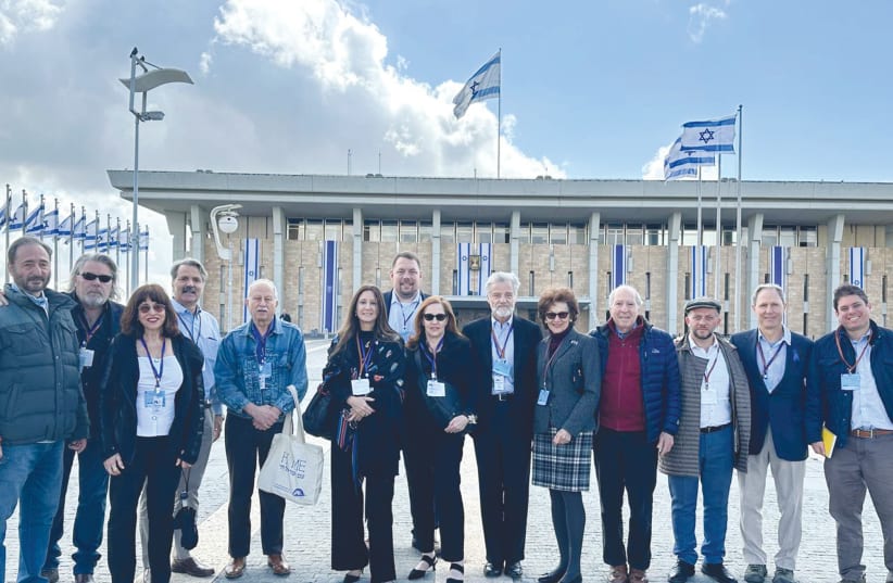 MEMBERS OF the Middle East Forum fact-finding delegation, including the writer – sixth from the left – pose outside the Knesset during their visit earlier this month. (photo credit: Courtesy Middle East Forum)