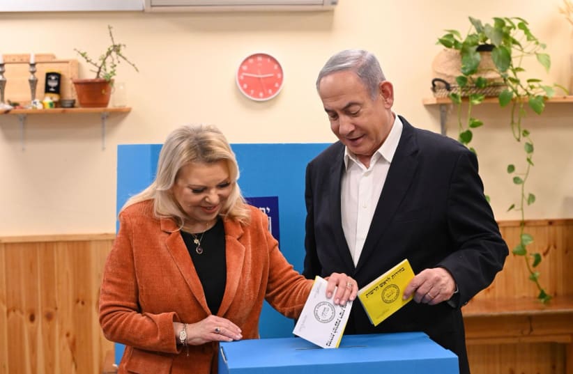  Prime Minister Benjamin Netanyahu and his wife Sara vote in the municipal elections in Jerusalem on February 27, 2024 (photo credit: CHAIM TZACH/GPO)