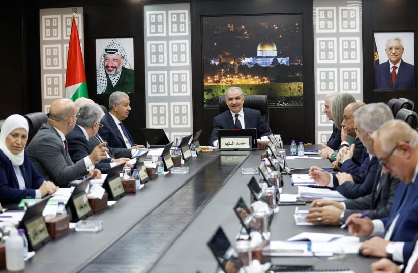  Palestinian Prime Minister Mohammad Shtayyeh convenes a cabinet meeting, amid reports about Prime Minister Shtayyeh announcing his resignation, in Ramallah in the Israeli-occupied West Bank, February 26, 2024.  (photo credit: REUTERS/Mohammed Torokman)