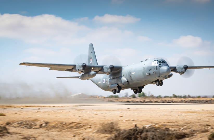  A C-130 Super Hercules. The aircraft can transport soldiers, gear, and water, and it can also be used to drop pamphlets of the type Israel has been dropping over Gaza to warn people to evacuate or to offer rewards for help finding hostages. (photo credit: IDF)