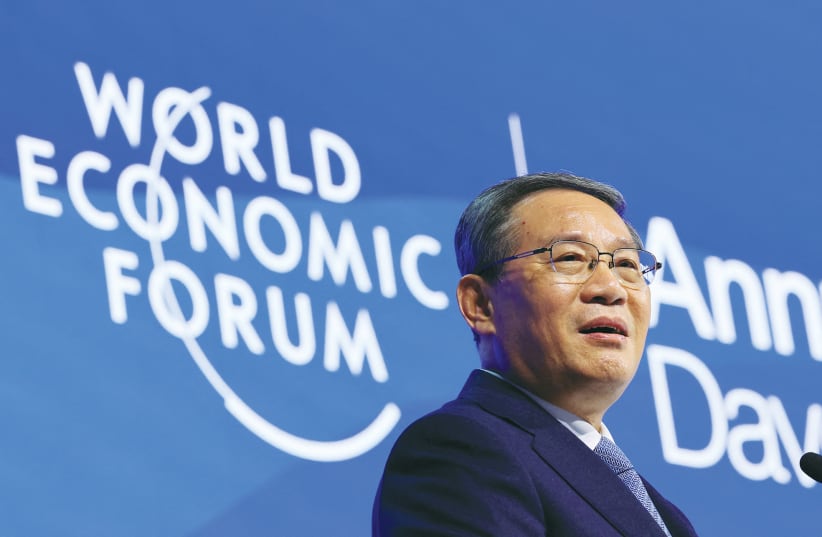  CHINA’S PREMIER Li Qiang speaks during the annual World Economic Forum in Davos, Switzerland, in January.  (photo credit: DENIS BALIBOUSE/REUTERS)
