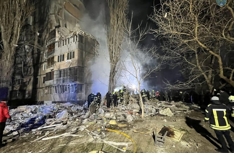  Rescuers work at a site of an apartment building heavily damaged by a Russian drone strike, amid Russia's attack on Ukraine, in Odesa, Ukraine, in this handout picture released March 2, 2024. (photo credit: PRESS SERVICE OF THE OPERATIONAL COMMAND 'SOUTH'/HANDOUT VIA REUTERS)