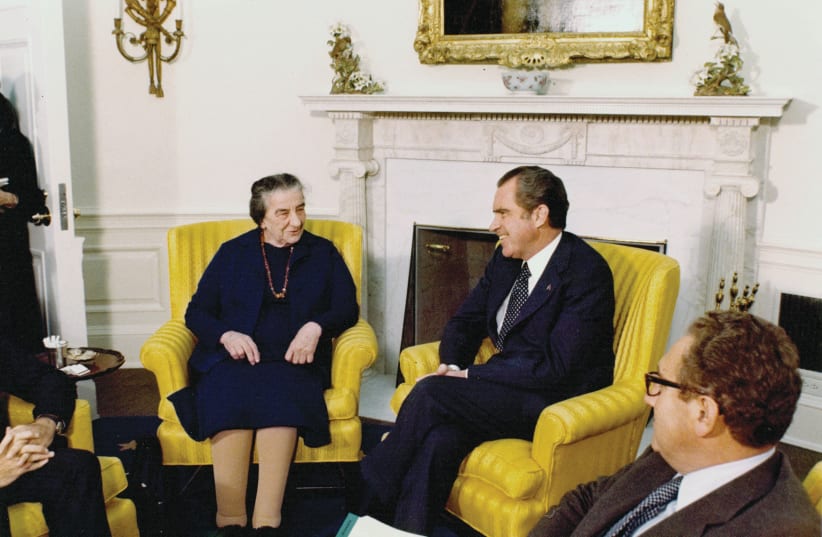  THEN-PRIME MINISTER Golda Meir meets with then-US president Richard Nixon in the Oval Office as then-secretary of state and national security advisor Henry Kissinger looks on, in November 1973.  (photo credit: Richard Nixon Museum and Library/Reuters)