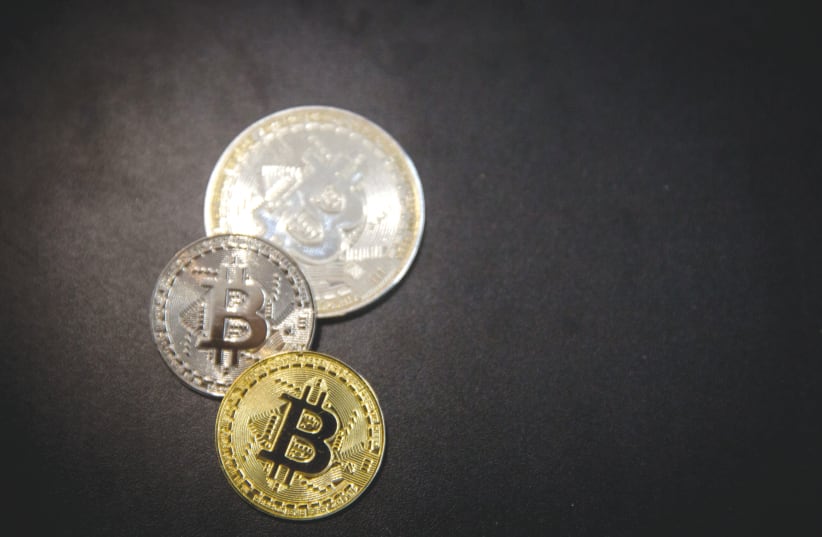  BITCOIN IS charting a bold course through uncharted waters, says the writer. (photo credit: MIRIAM ALSTER/FLASH90)