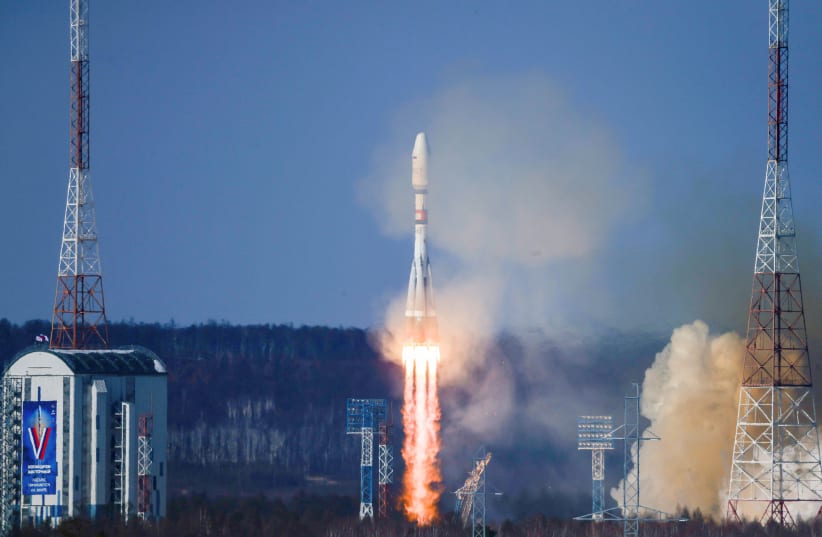  A Soyuz-2.1b rocket booster with a Fregat upper stage, carrying Russian the Meteor-M spacecraft and 18 Russian and foreign additional small satellites, blasts off from a launchpad at the Vostochny Cosmodrome in the far eastern Amur region, Russia, February 29, 2024.  (photo credit: Andrey Shelepin/GCTC/Russian space agency Roscosmos/Handout via REUTERS)