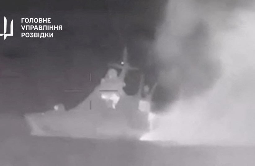  Handout footage shows smoke rising from what Ukrainian military intelligence said is the Russian Black Sea Fleet patrol ship Sergey Kotov that was damaged by Ukrainian sea drones, at sea, at a location given as off the coast of Crimea, in this still image obtained from a video released on March 5,  (photo credit: Ministry of Defence Ukraine/via REUTERS)