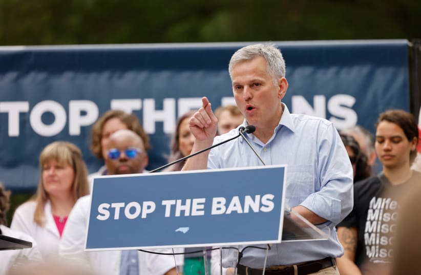  North Carolina AG Josh Stein speaks at a rally in North Carolina, US, May 13, 2023.  (photo credit: REUTERS)
