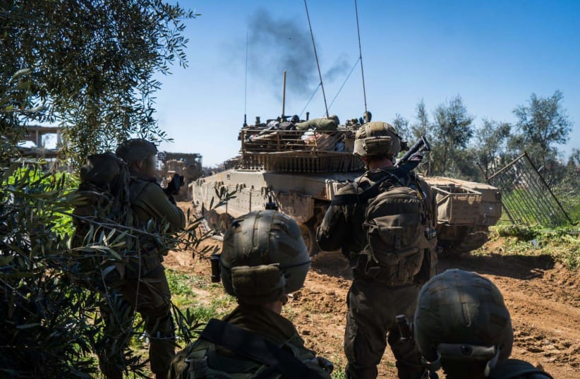  IDF soldiers from the Nahal Brigade eliminating a terrorist cell, March 7, 2024.  (photo credit: IDF SPOKESPERSON UNIT)
