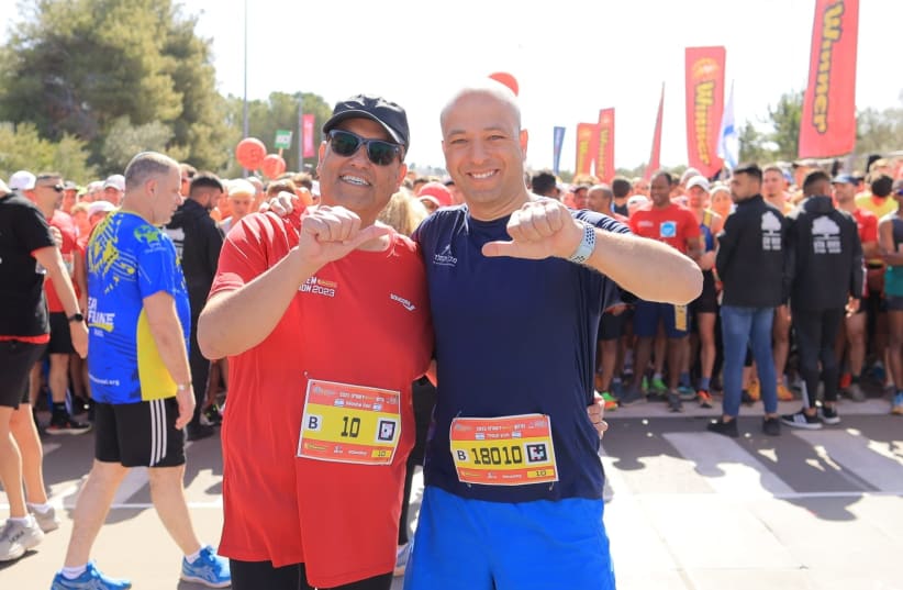  Glory is eternal! Trainer Itzik Weksler (R) with Maor Moshe Lion at a previous Jerusalem Winner Marathon. (photo credit: ARNON BOSSANI)