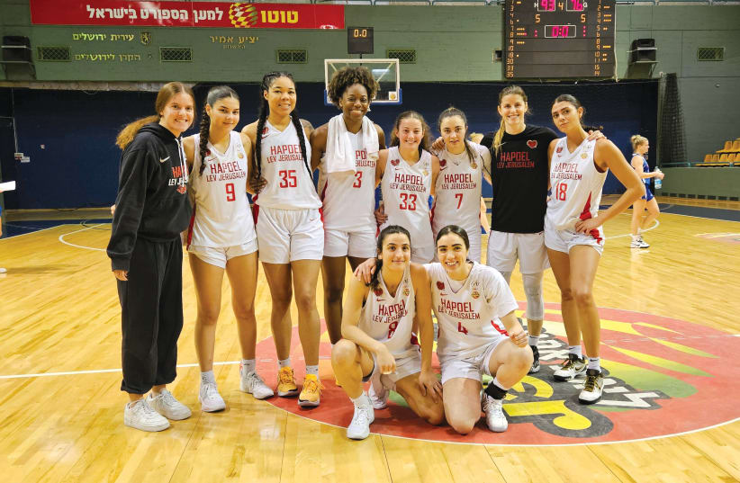  The red and white: On the court with Hapoel Lev Jerusalem basketball club. (photo credit: TAL MAROM)