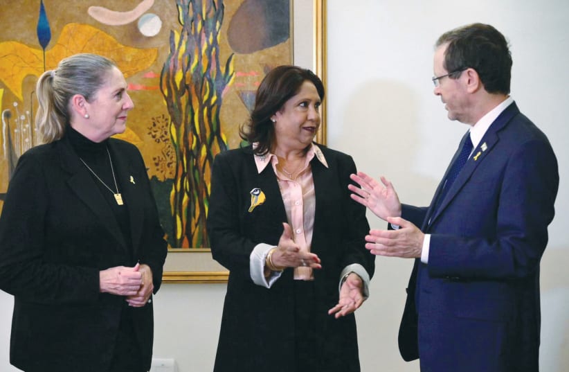 PRESIDENT ISAAC Herzog speaks with Pramila Patten, UN special representative of the secretary-general on sexual violence in conflict, as the president’s wife, Michal, looks on, at the President’s Residence in Jerusalem, in January.  (photo credit: AMOS BEN-GERSHOM/GPO)