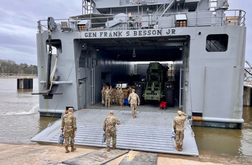  Personnel board the US Army Vessel (USAV) General Frank S. Besson (LSV-1) from the 7th Transportation Brigade (Expeditionary), 3rd Expeditionary Sustainment Command, XVIII Airborne Corps as it departs en route to the Eastern Mediterranean, March 9, 2024. (photo credit: VIA REUTERS)