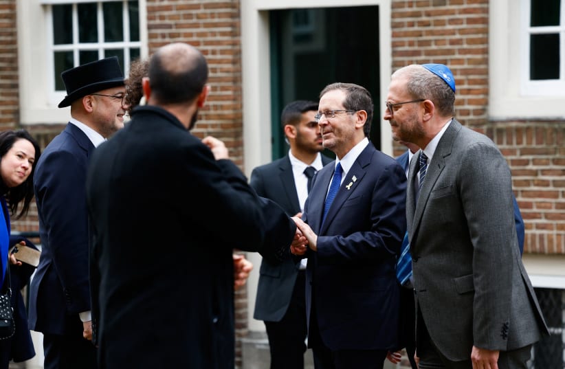  Israeli President Isaac Herzog arrives at the Portuguese Synagogue on the day of the opening of the National Holocaust Museum, in Amsterdam, Netherlands, March 10, 2024. (photo credit: REUTERS/PIROSCHKA VAN DE WOUW)