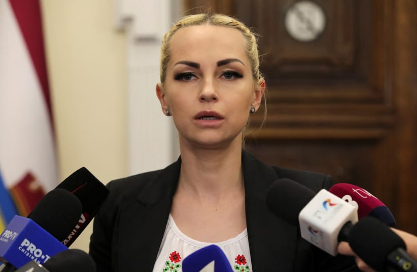  Marina Tauber, leader of the opposition pro-Russian political party Shor that was banned by the ruling of the Constitutional Court, speaks with journalists after a hearing in Chisinau, Moldova, June 19, 2023. (photo credit: REUTERS/VLADISLAV CULIOMZA)