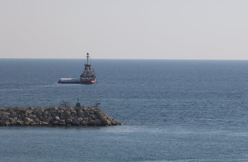  El Open Arms, buque de rescate propiedad de una ONG española, parte con ayuda humanitaria hacia Gaza desde Larnaca, Chipre, el 12 de marzo de 2024. (photo credit: REUTERS/YIANNIS KOURTOGLOU)