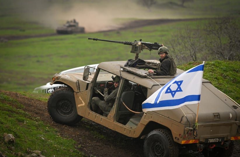  take part in a military drill in the Golan Heights, northern Israel, February 13, 2024 (photo credit: MICHAEL GILADI/FLASH90)