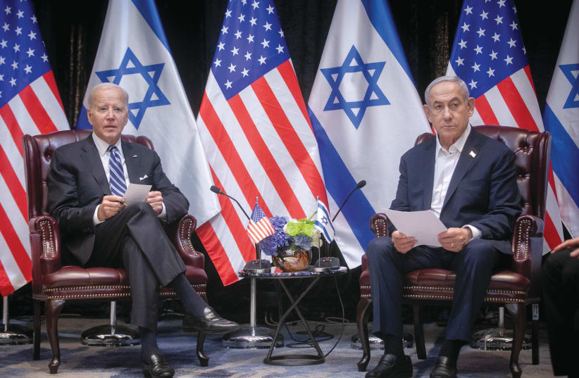  El PRIMER MINISTRO Benjamin Netanyahu se reúne con el Presidente de EE.UU. Joe Biden en Tel Aviv, en octubre. (photo credit: MIRIAM ALSTER/FLASH90)