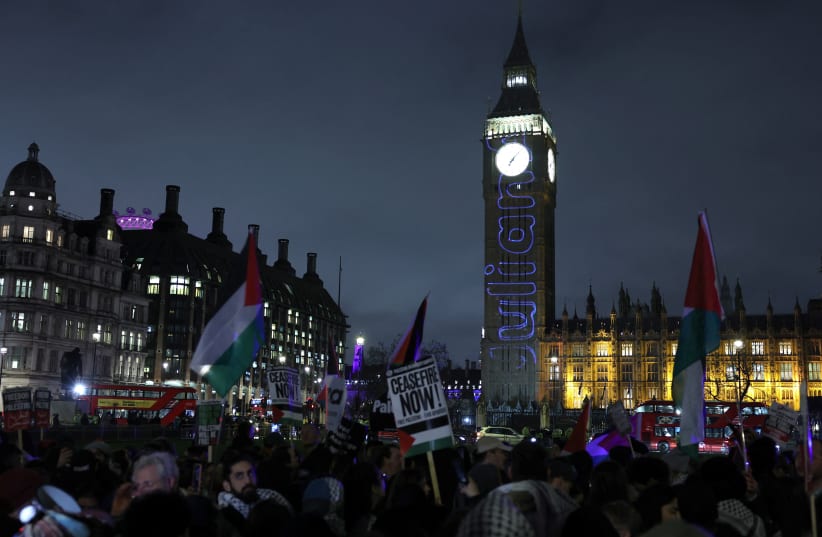  People demonstrate on the day of a vote on the motion calling for an immediate ceasefire in Gaza, amid the ongoing conflict between Israel and the Palestinian Islamist group Hamas, in London, Britain, February 21, 2024.  (photo credit: REUTERS/Isabel Infantes)