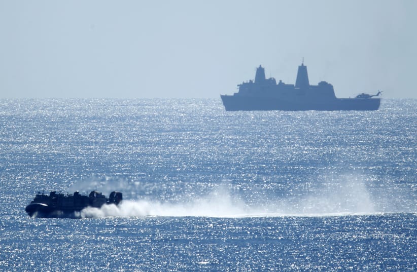  A US military Landing Craft, Air Cushion (LCAC) heads to shore as the USS Makin Island Amphibious Ready Group and 11th Marine Expeditionary Unit return after a seven month deployment to Camp Pendleton, California February 23, 2015. (photo credit: MIKE BLAKE/REUTERS)