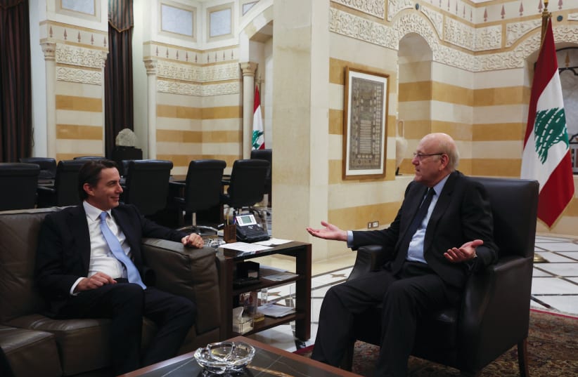  US ENVOY Amos Hochstein (L) meets with Lebanon’s caretaker Prime Minister Najib Mikati in Beirut, March 4.  (photo credit: MOHAMED AZAKIR/REUTERS)