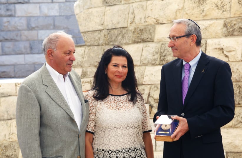  (From L) MICHAEL & APRIL ROSENFELD with Prof. Menahem Ben Sasson, chancellor of Hebrew University of Jerusalem, during the Wall of Life ceremony on Mount Scopus (photo credit: Courtesy Rosenfeld family)