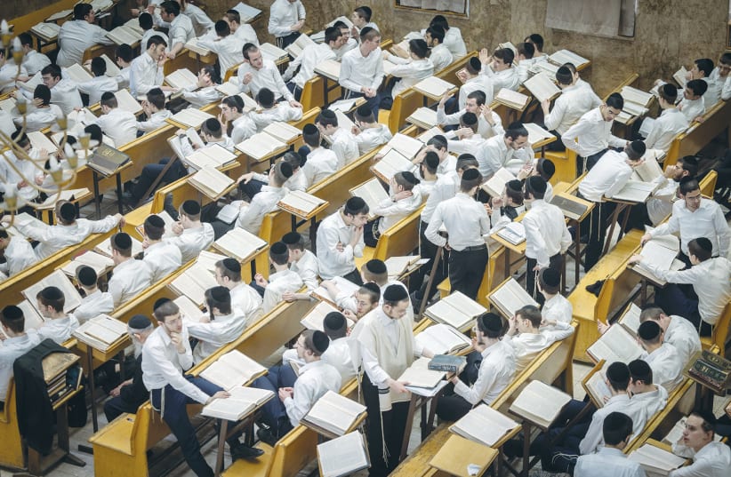  HAREDI STUDENTS learn in a yeshiva. (photo credit: FLASH90/CHAIM GOLDBERG)