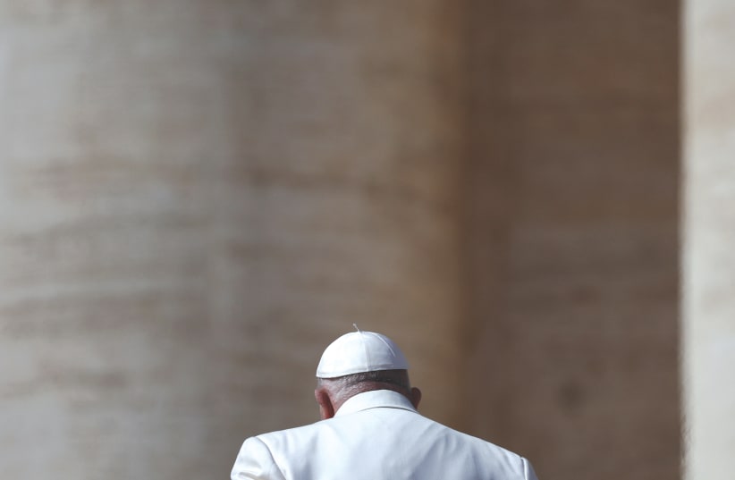 POPE FRANCIS leaves after the weekly general audience in St. Peter’s Square at the Vatican, on Wednesday (photo credit: Guglielmo Mangiapane/Reuters)