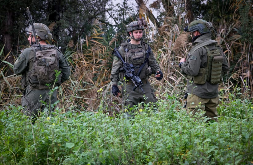  Israeli security forces at the site where two drones entered Israel from Lebanon crashed in an open area near Kfar Blum, northern Israel, January 25, 2024. (photo credit: David Cohen/Flash90)