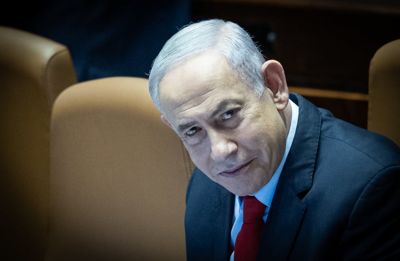  Israeli prime minister Benjamin Netanyahu attends a vote on the state budget at the assembly hall of the Knesset, the Israeli parliament in Jerusalem, March 13, 2024.  (photo credit: YONATAN SINDEL/FLASH90)