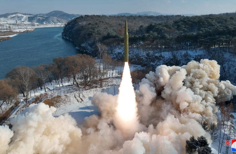  Ballistic missile, said to be solid-fuel and hypersonic, launches during a test at an unspecified location in North Korea in this picture released by the Korean Central News Agency on January 14, 2024 (photo credit: KCNA/REUTERS)