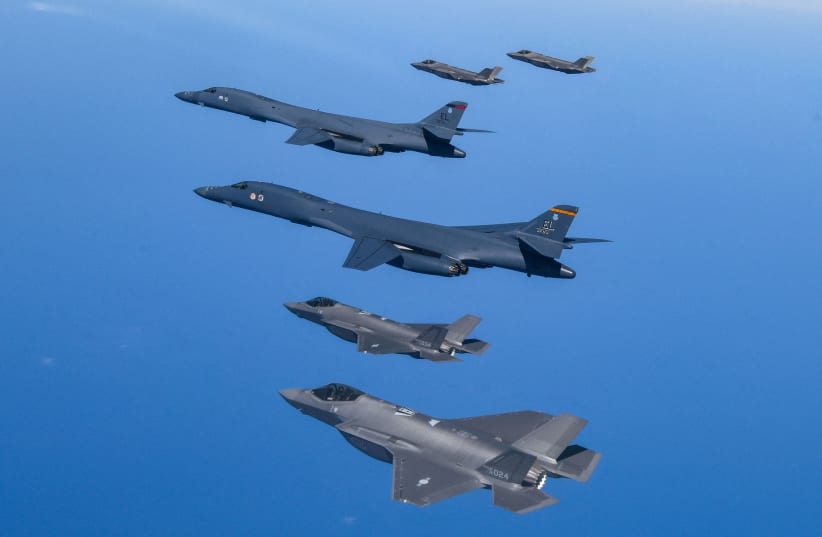  US Air Force B-1B bombers and South Korean Air Force F-35A take part in a joint air drill, South Korea, March 19, 2023. (photo credit: SOUTH KOREAN DEFENSE MINISTRY/HANDOUT VIA REUTERS)