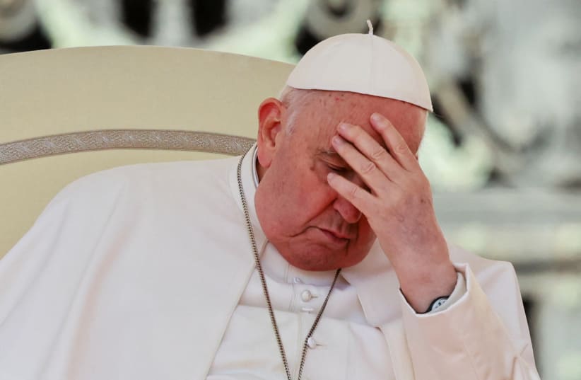  Pope Francis reacts during the weekly general audience in St. Peter's Square at the Vatican, March 20, 2024. (photo credit: REUTERS/YARA NARDI)