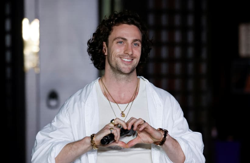  Actor Aaron Taylor-Johnson attends a photo session after a Buddhism ritual to pray for success for his movie 'Bullet Train' at Koyasan Tokyo Betsuin Temple in Tokyo, Japan, August 22, 2022. (photo credit: REUTERS/ISSEI KATO)