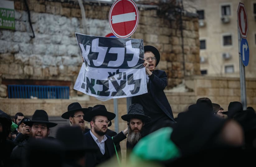 ULTRA-ORTHODOX men protest against the haredi draft, in Jerusalem last week. (photo credit: YONATAN SINDEL/FLASH90)
