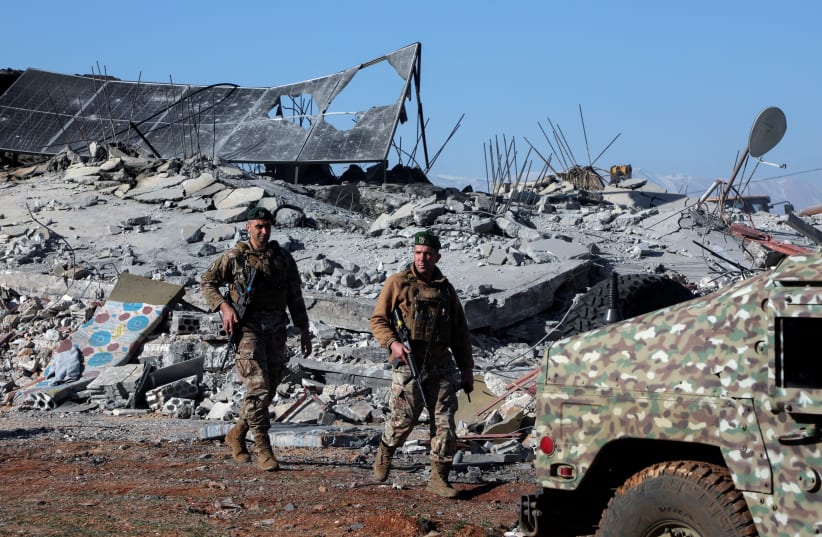  Lebanese army soldiers secure a site that was hit by a strike, after Israeli jets hit Lebanon's Bekaa Valley for a second day on Tuesday, according to security sources, in Saraain, Lebanon March 12, 2024. (photo credit: REUTERS/MOHAMED AZAKIR/FILE PHOTO)