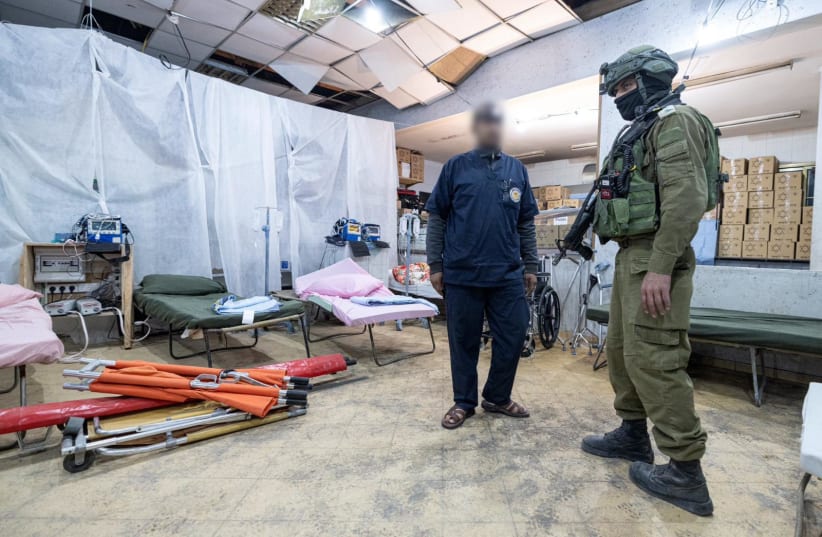  An IDF solider and medical professional in the new dedicated medical area in the Gaza Strip, March 24, 2024. (photo credit: IDF SPOKESPERSON'S OFFICE)