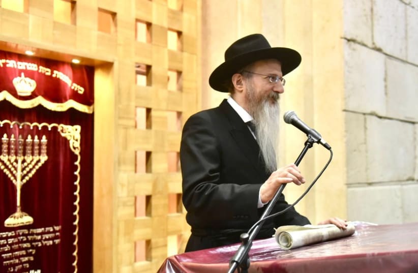   Russian Chief Rabbi Berel Lazar before the reading of the Megillah in the central synagogue in Moscow. (photo credit: Courtesy)