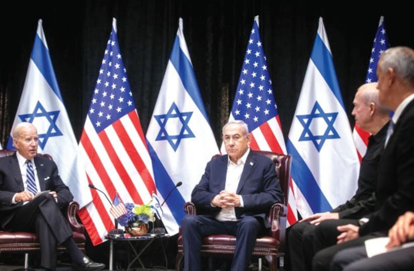  Joe Biden and Benjamin Netanyahu at the War Cabinet meeting in Jerusalem last October (photo credit: MIRIAM ALSTER/FLASH90)