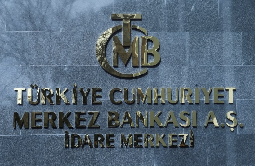  A logo of Turkey's Central Bank is pictured at the entrance to its headquarters in Ankara, Turkey February 8, 2024. (photo credit: REUTERS/CAGLA GURDOGAN)