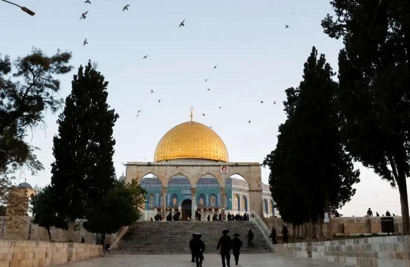   Recruiting for the Palestinian struggle: "The Jews want to take over Al-Aqsa."  (photo credit: REUTERS)