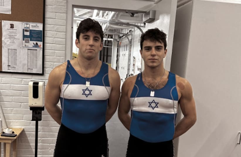  NATHAN (left) and Asher Swidler pose in their specially designed pro-Israel unisuit, which they use as members of the Brown Crew Team.  (photo credit: Zachary Atalay/Courtesy)