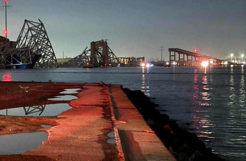  A view of the Francis Scott Key Bridge after it collapsed, in Baltimore, Maryland, U.S., in this picture released on March 26, 2024.  (photo credit: Harford County MD Fire & EMS/Handout via REUTERS)